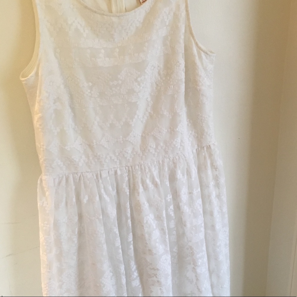 White knee length dress